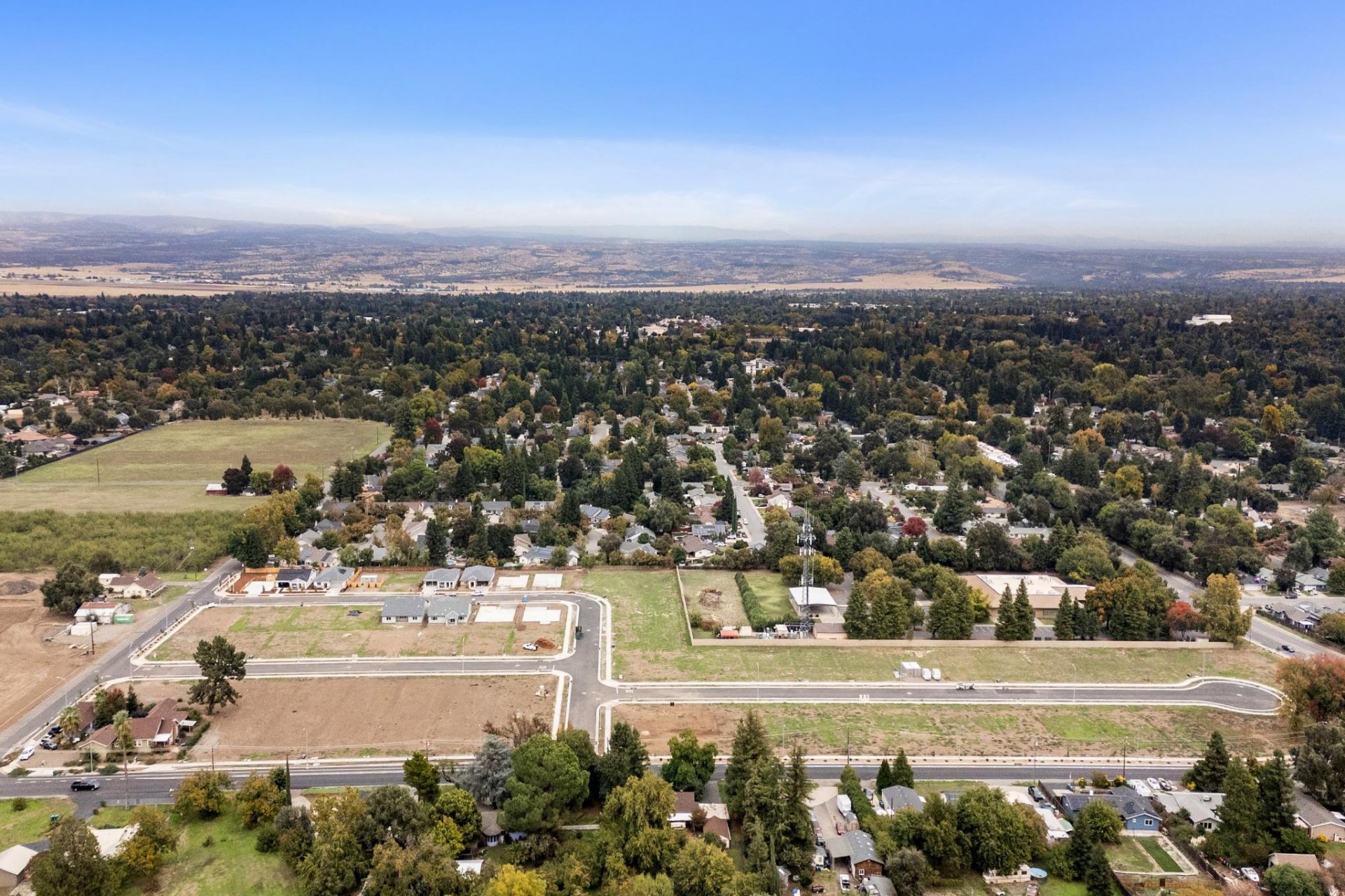 Elevated drone shot of the community land where homes will be built in Chico, CA.