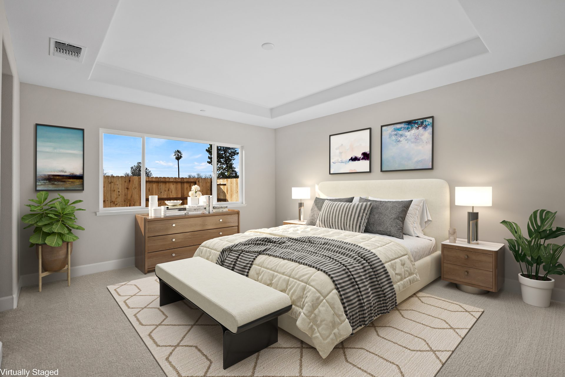A virtually staged bedroom with queen size bed complete with a headboard and comforter set, along with a dresser and nightstands, table lamps and various décor items including potted plants.